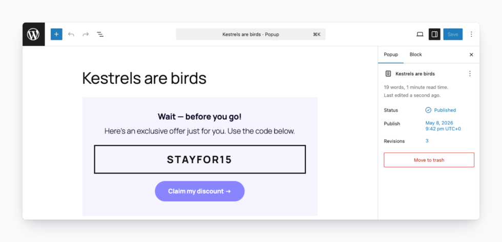 WordPress block editor designing a popup titled "Kestrels are birds," showing the popup content card ("Wait — before you go!" with a STAYFOR15 coupon code and Claim my discount button) and the Popup status sidebar on the right showing Published status, publish date, and revisions count.