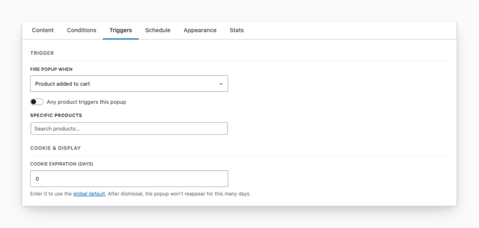 Splash Popup's Triggers tab with "Fire popup when" set to "Product added to cart," a toggle for "Any product triggers this popup," a Specific products search field, and Cookie & Display frequency controls below.