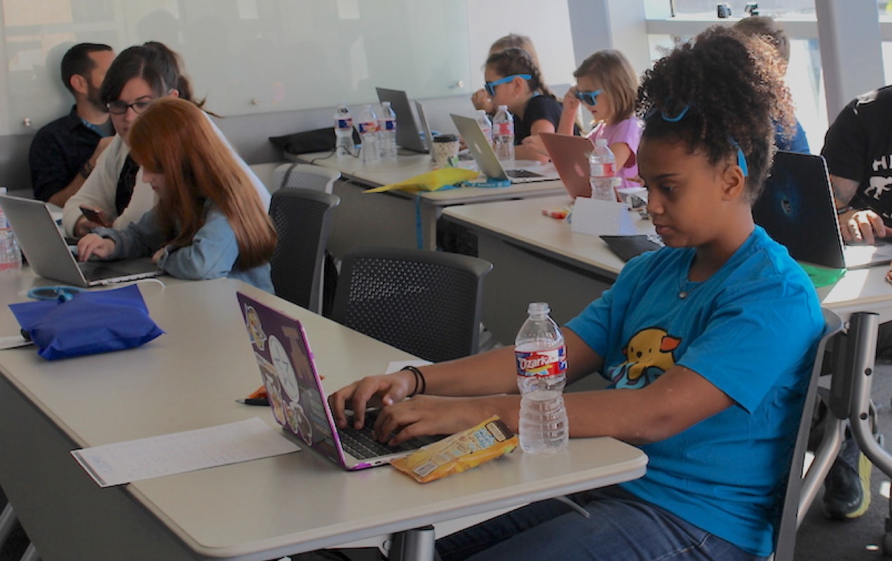 Annika working on her website at KidsCamp