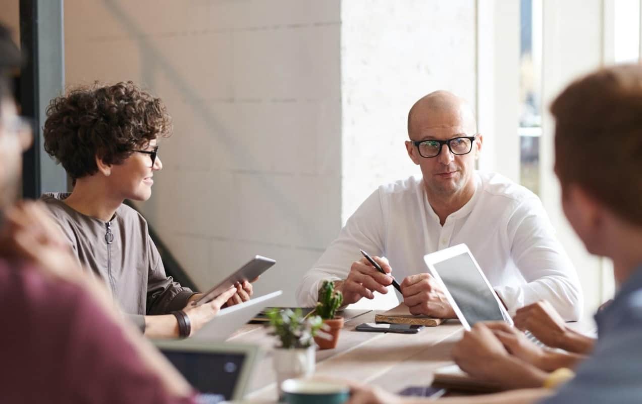 team meeting around a table