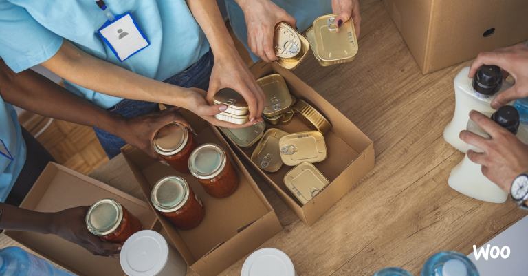 volunteers put together boxes of food