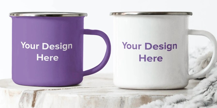 two customized white and purple mugs