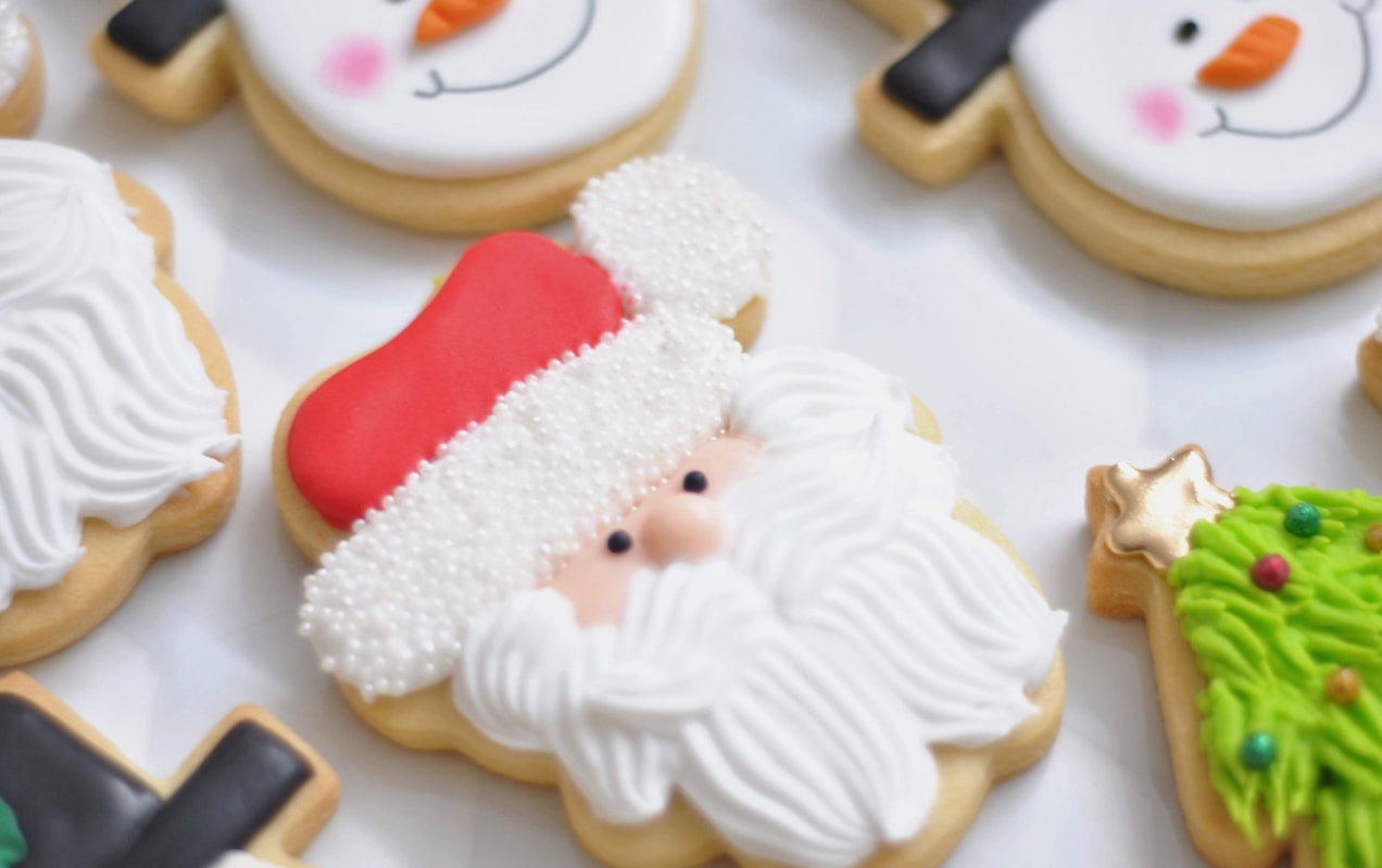 box of iced Christmas cookies