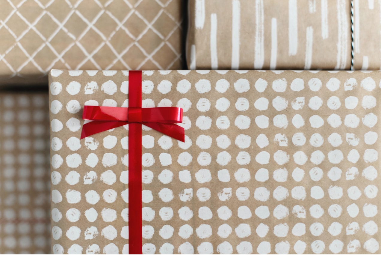 stack of gift wrapped packages