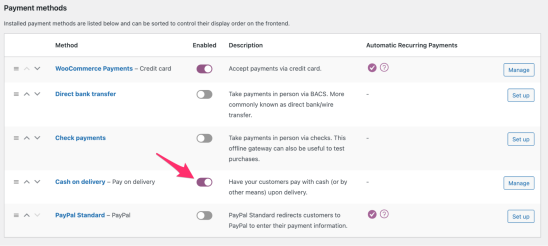 Highlighting the Cash on delivery payment method under the Payments tab in WooCommerce Settings. 