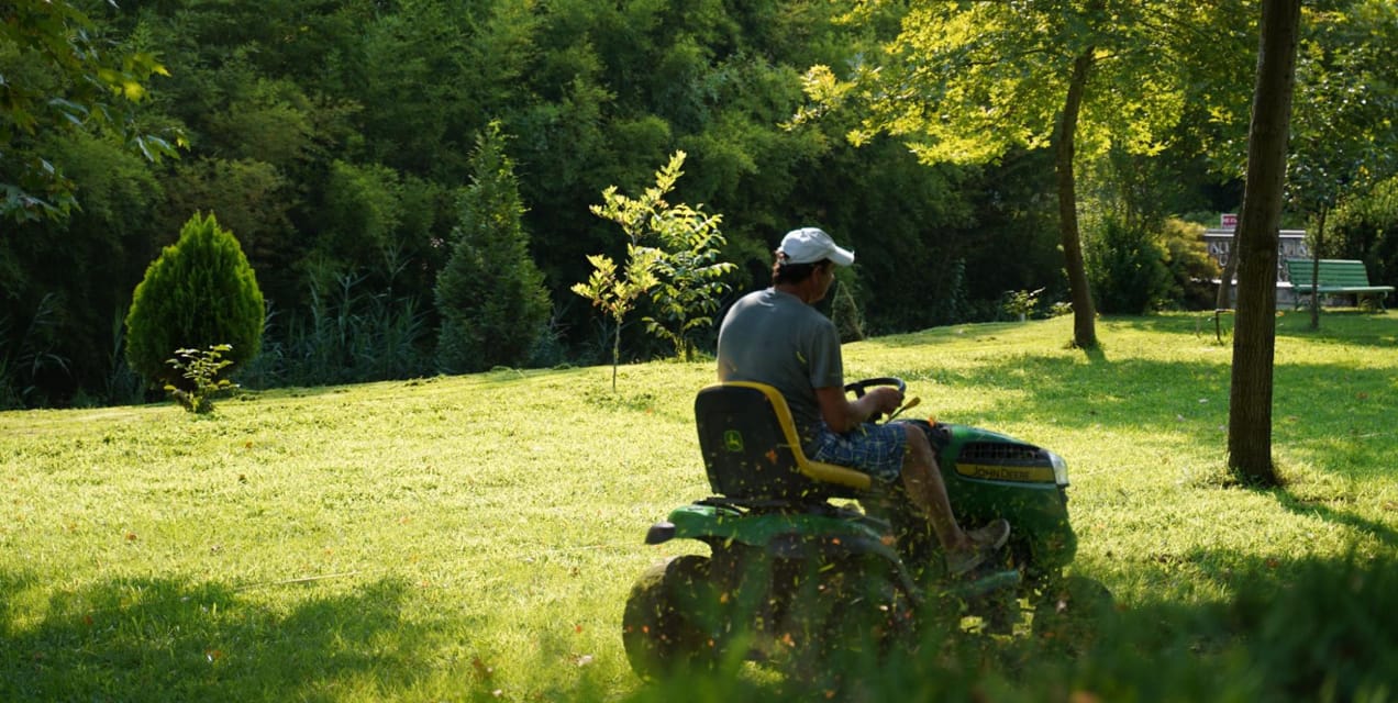 professional mowing a lawn