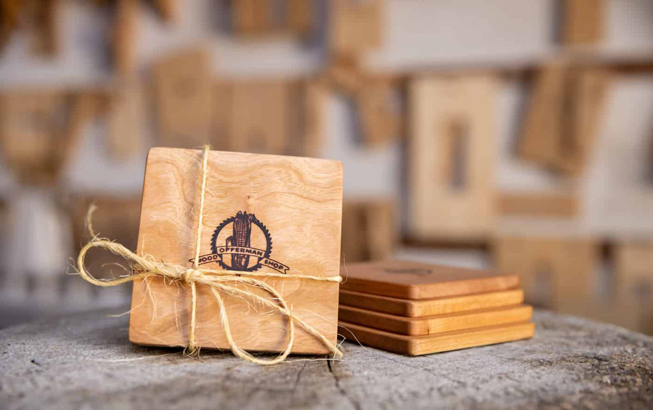wood coasters with the Offerman Woodshop logo