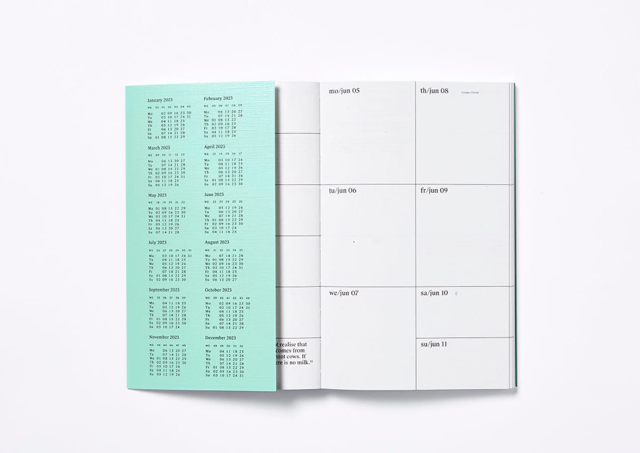 green planner with calendar dates