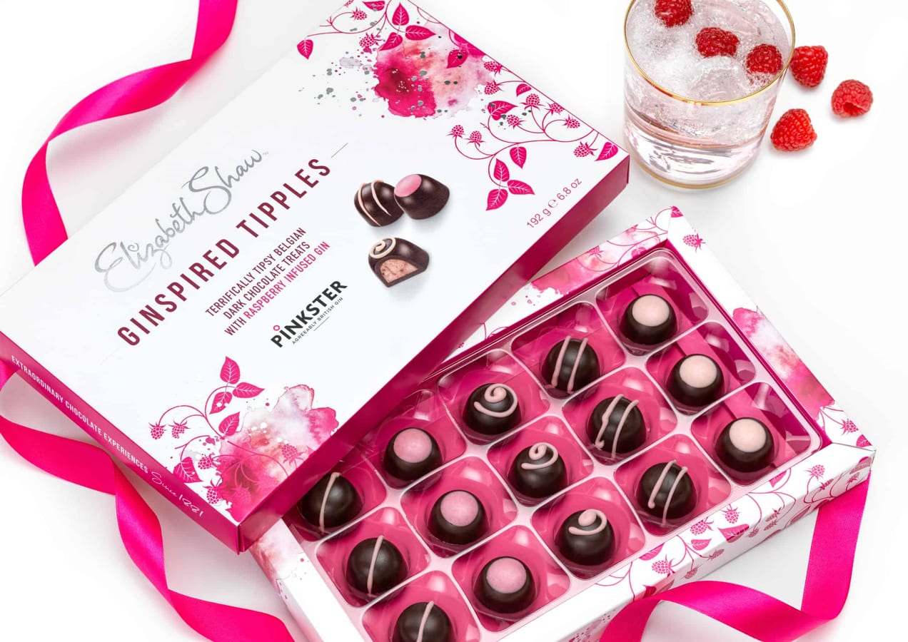 box of truffles with a pink lining