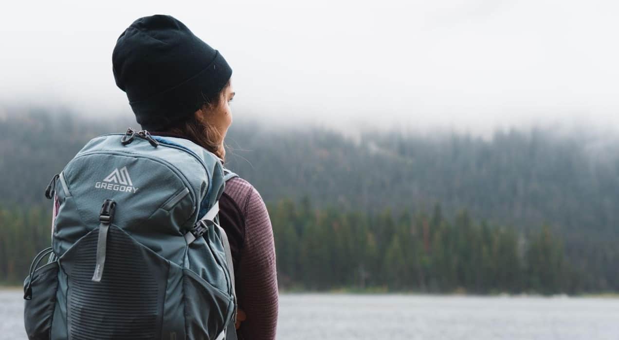 woman hiking with a backpack