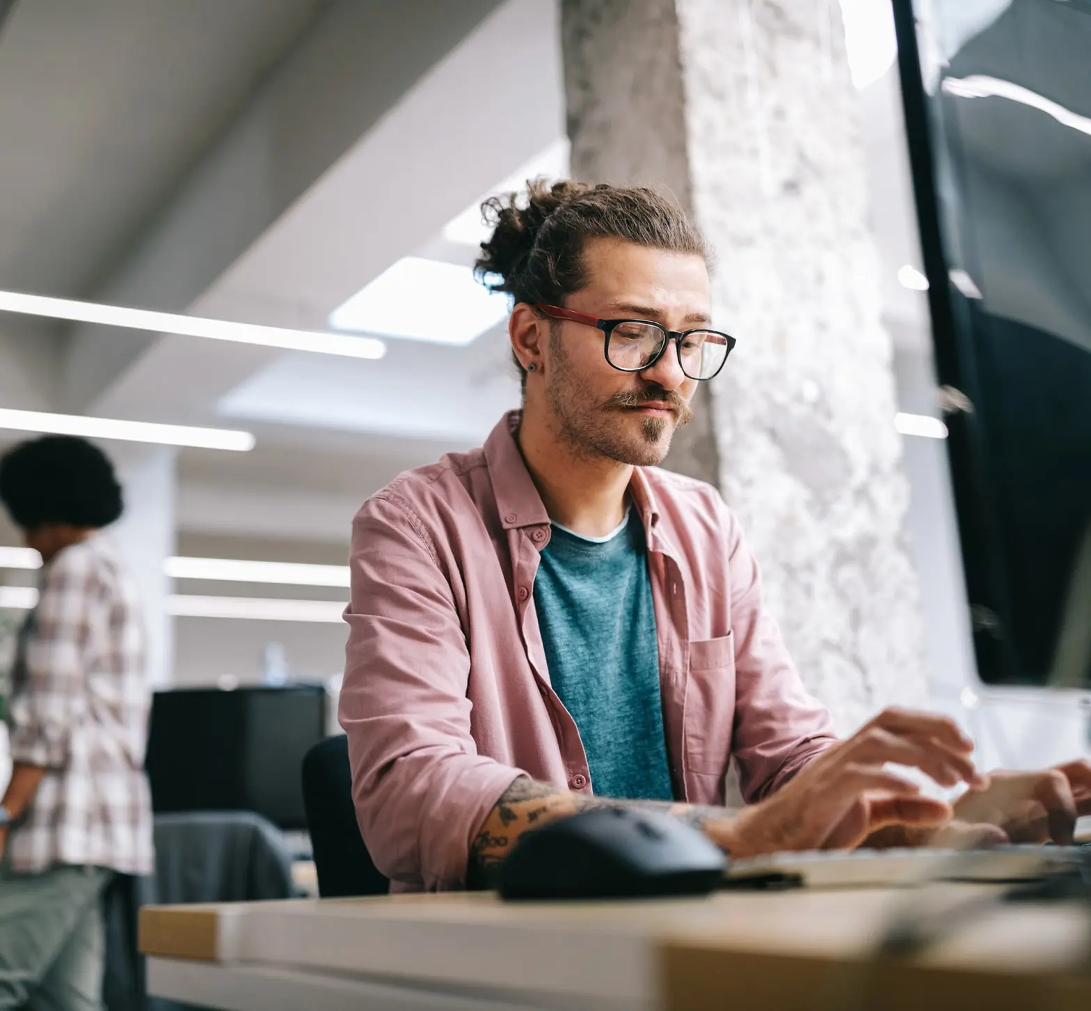 A person typing on a laptop displaying an online store with product images of water bottles, overlaid with UI cards showing store analytics and a checkout button against a purple graphic background.