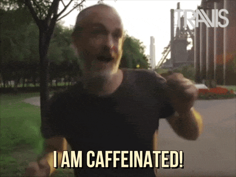GIF of a man dancing with the text "I am caffeinated!"