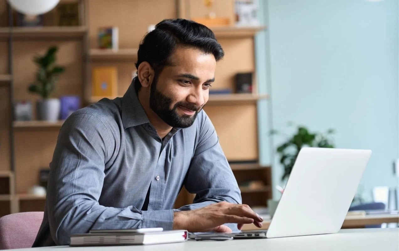 business owner working on a laptop