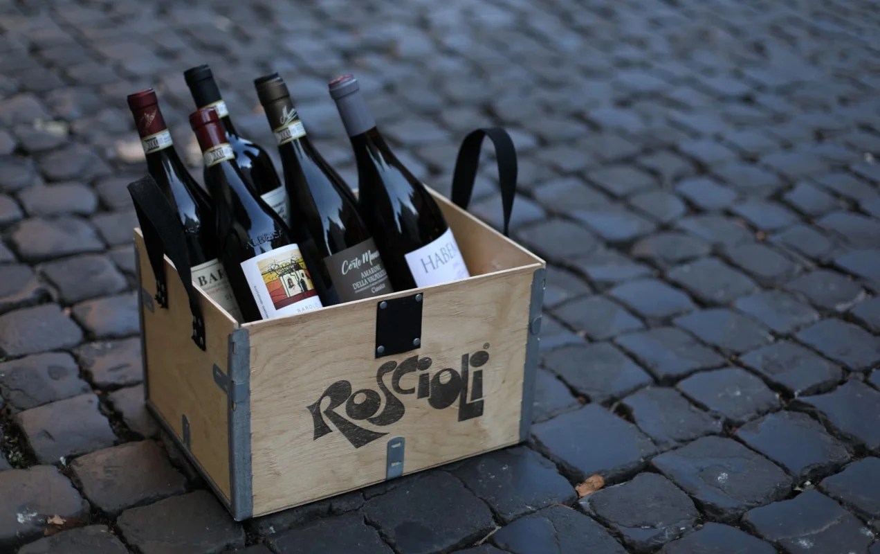 beautiful box of wines sitting on a doorstep