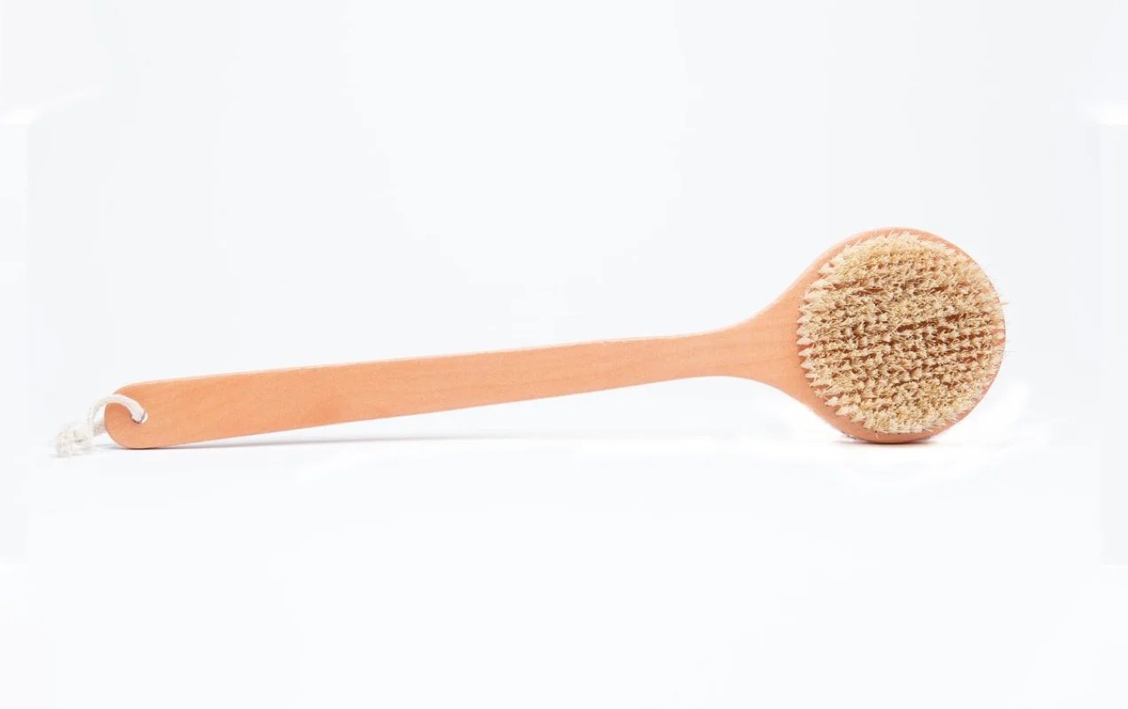 wooden dry brush with a long handle