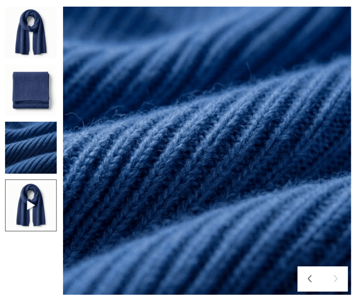Product gallery showing the scarf video with its play-icon thumbnail selected